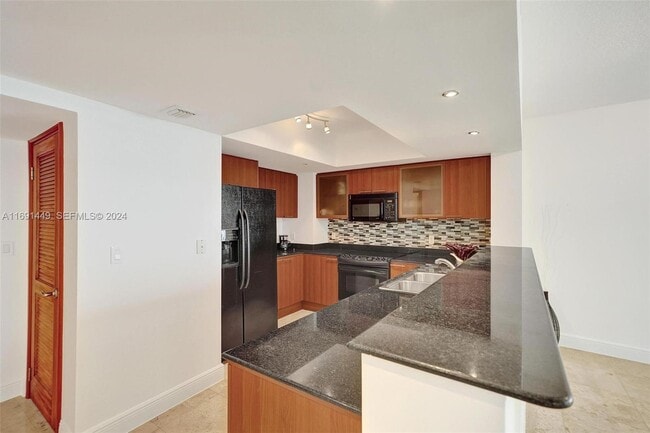 Building Photo - 16699 Collins Ave