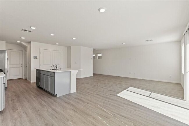 Building Photo - Modern 4-Bedroom Home with Turf Backyard in Gated Community