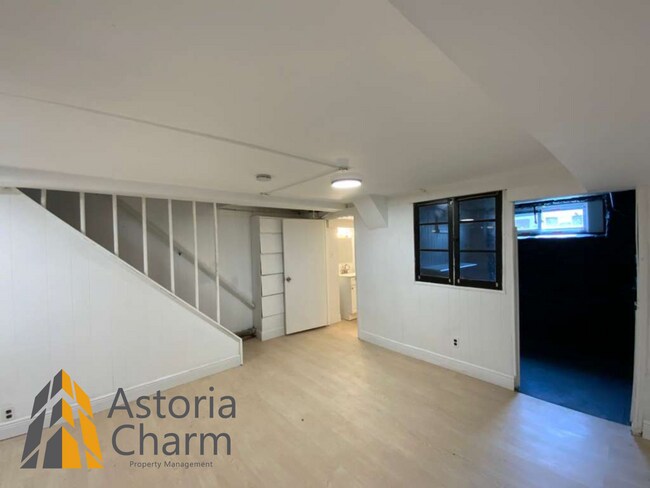 Building Photo - 2 Bed with Finished Basement, Deck off Bedroom, and Backyard