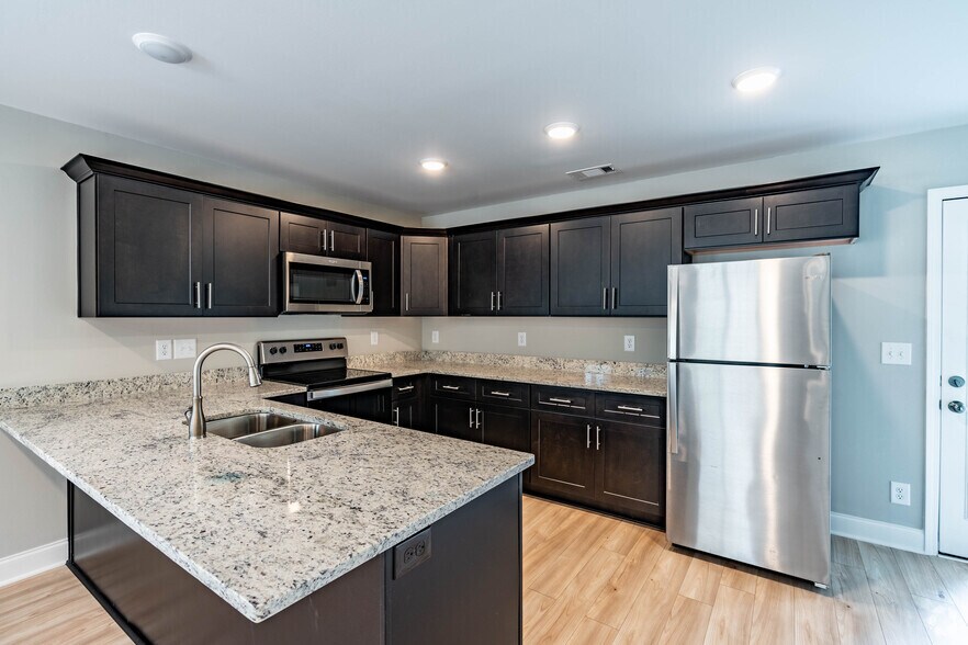 Primary Photo - East Adams Townhomes