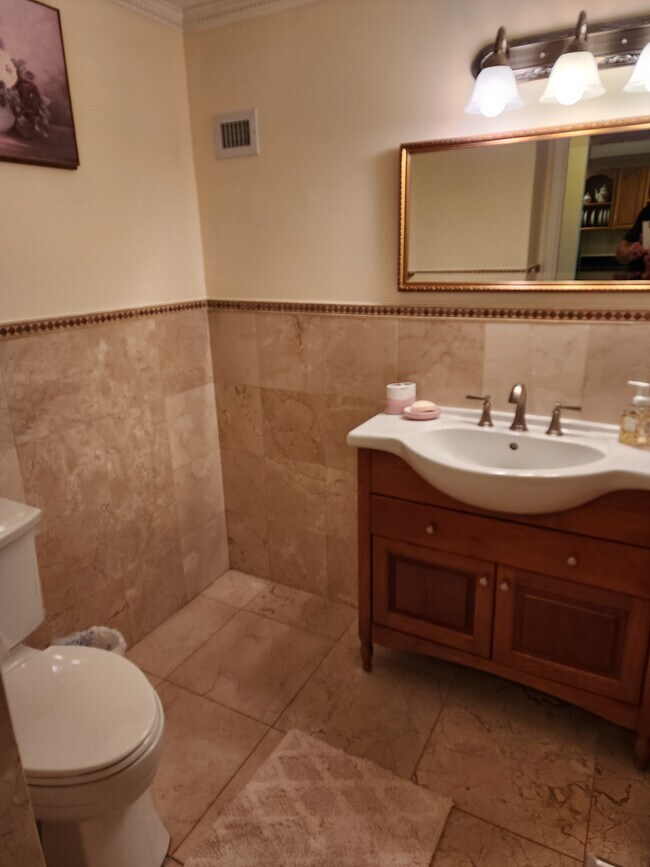 Powder Room - 3140 S Ocean Dr