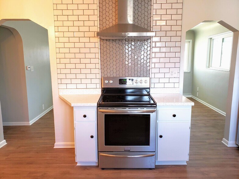 Tiled Backsplash and stainless steel appliances - 3155 S Fox St