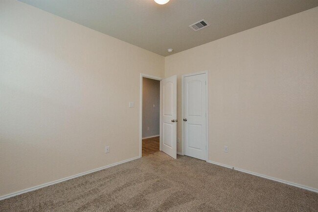 Building Photo - 6035 Purple Iris St