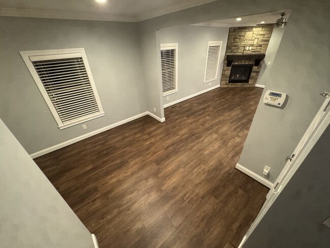 Living room and stairway base - 9 Allen Ave