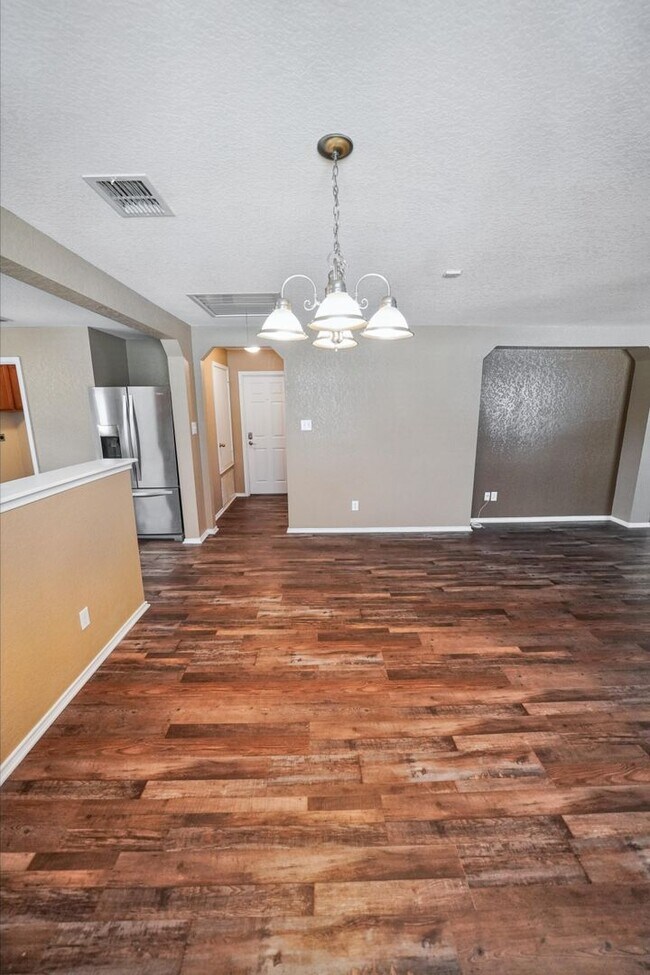 Building Photo - Energy-Smart Single-Story Now Available in...