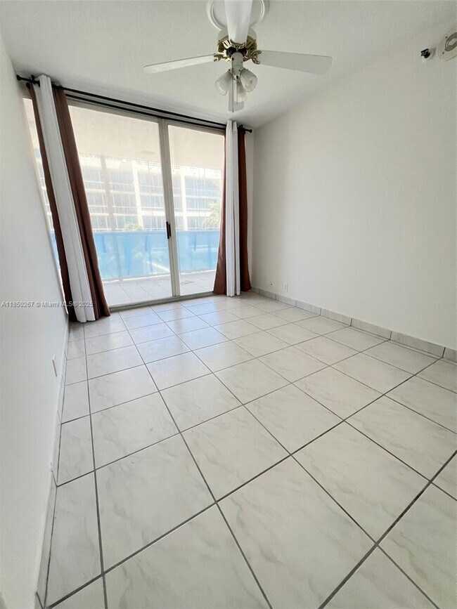 Building Photo - 6767 Collins Ave