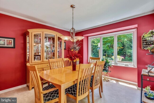 Building Photo - Experience elevated living in this beautifully renovated townhome nestled within the highly sough...
