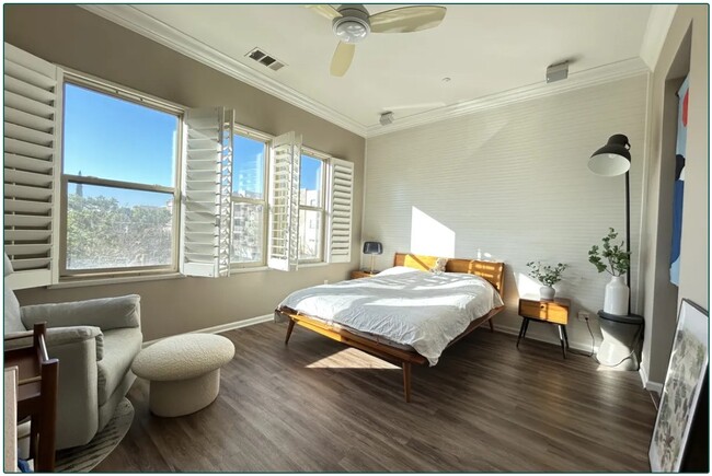 Master bedroom feat. high ceilings and beautiful plantation shutters - 5429 Strand