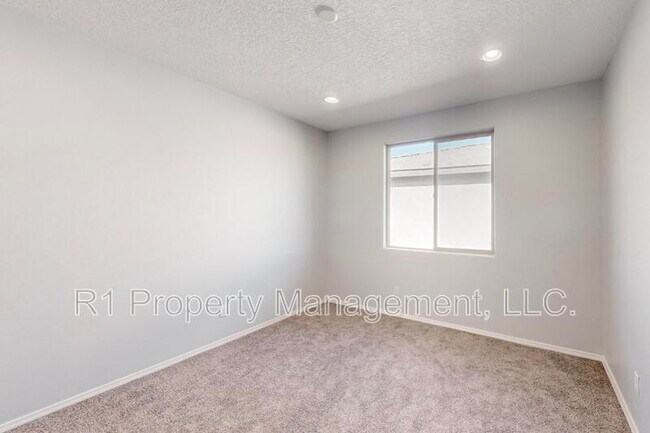 Building Photo - 6405 Kings Cyn Cv NE