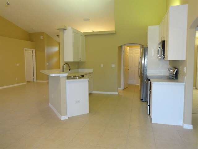 Building Photo - 5869 NW Leghorn Ave