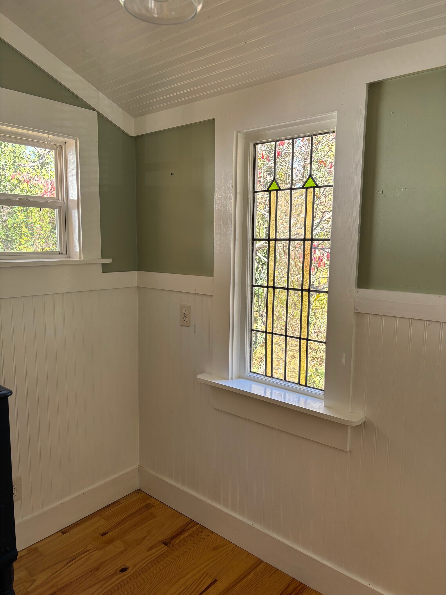 Stained glass window in sunroom - 127 Shelburne Rd