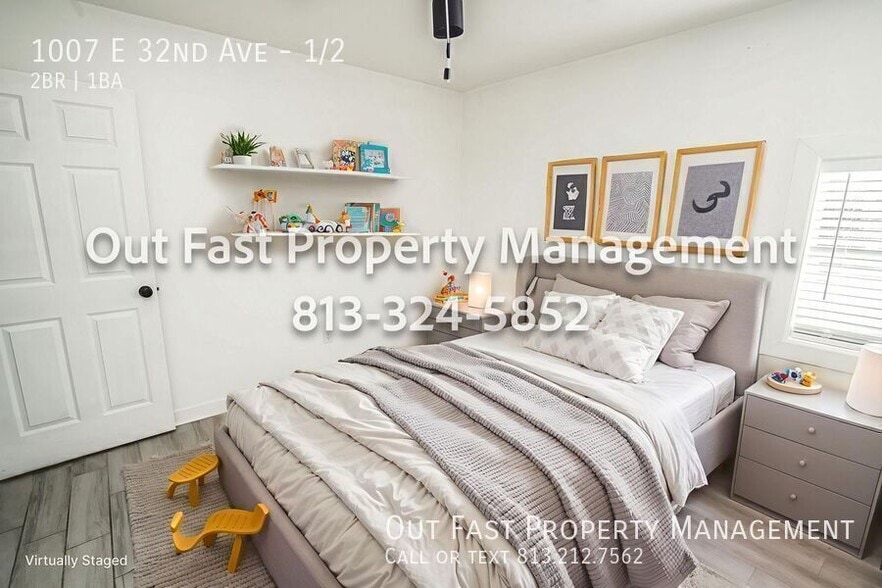 Building Photo - 1007 E 32nd Ave