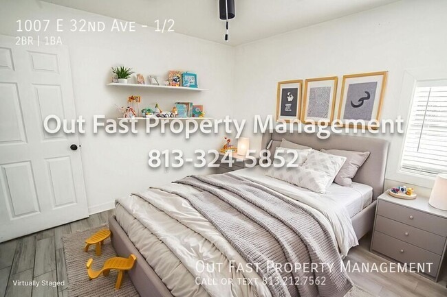 Building Photo - 1007 E 32nd Ave