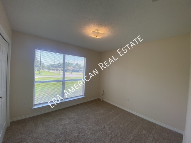 Building Photo - 7468 Woodmont Rd