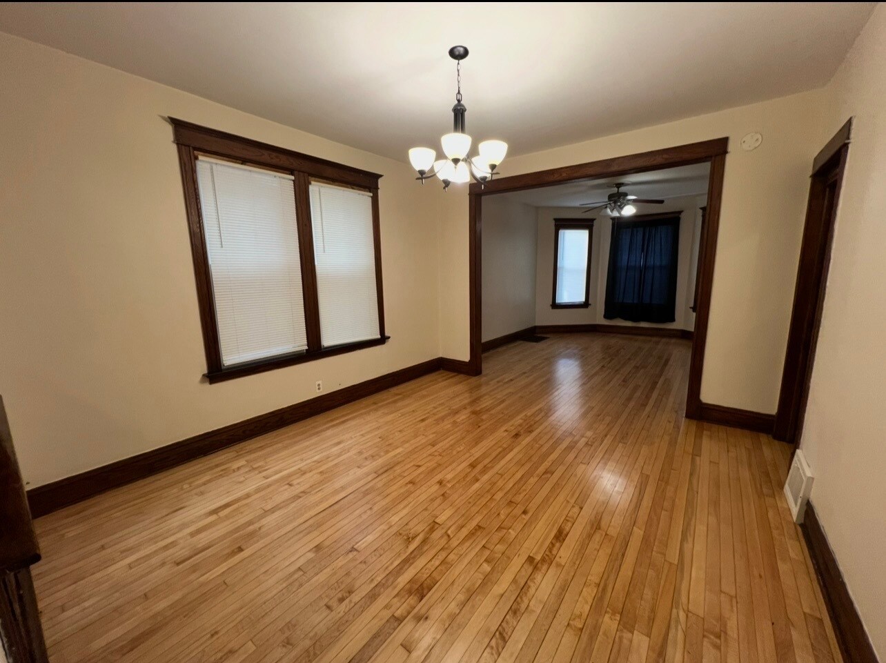 Dining room with new life, fixtures, and blinds - 3748 W Lyndale St