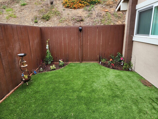 Building Photo - Coming in June......Sunny & Spacious 3BR Condo – Minutes from the Beach