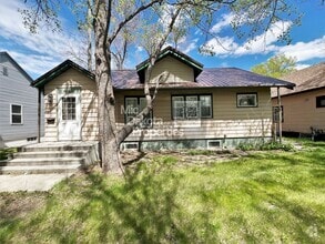 Building Photo - 414 W 11th- 4 bedroom house with a garage
