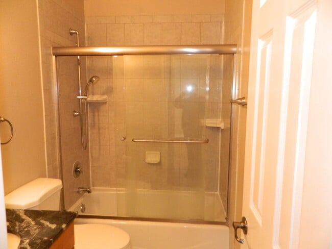 Building Photo - Townhouse w/ Garage & Private Patio, Walking distance to shopping, near highly rated schools