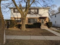 Building Photo - Gorgeous 3 Bed Upper Available with shared Garage & Hardwood floors, Appliances incl.