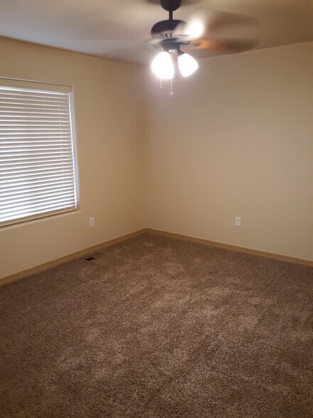 all three bedrooms with carpet and ceiling fans - 2310 Cliffmoor Ln