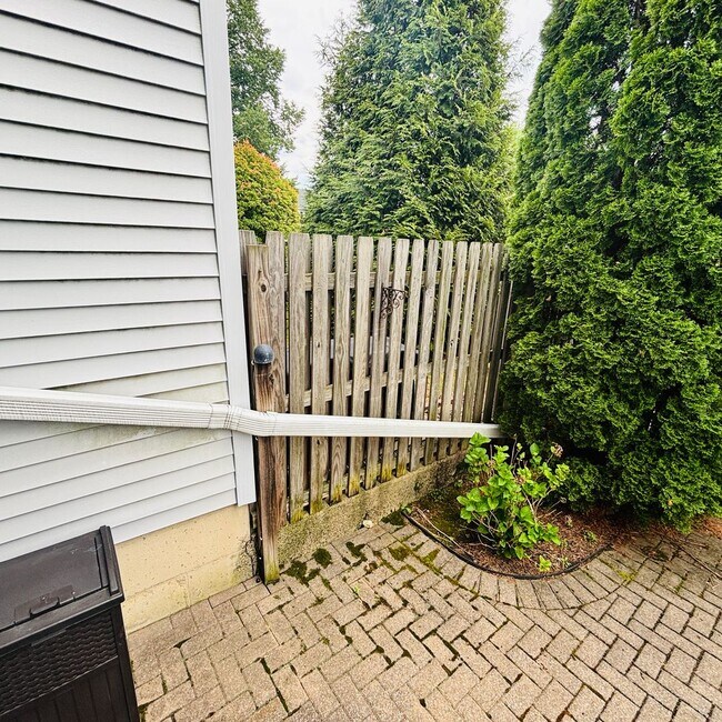 Building Photo - Spacious 3-Bedroom, 3-Bathroom Townhome with Finished Basement, Garage & Fenced Yard