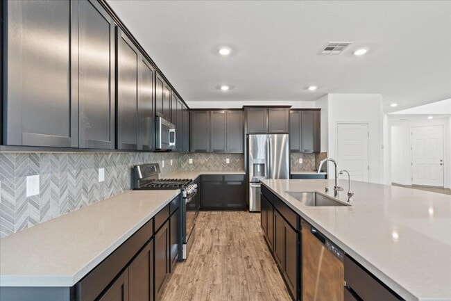 Building Photo - Spacious 5-bedroom home in gated community