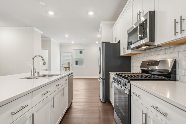 Building Photo - Available Now! New Construction - 3 Bedroo...