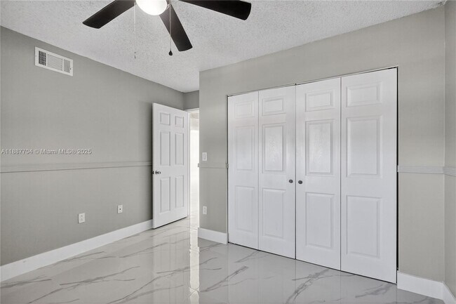 Building Photo - 9915 W Okeechobee Rd