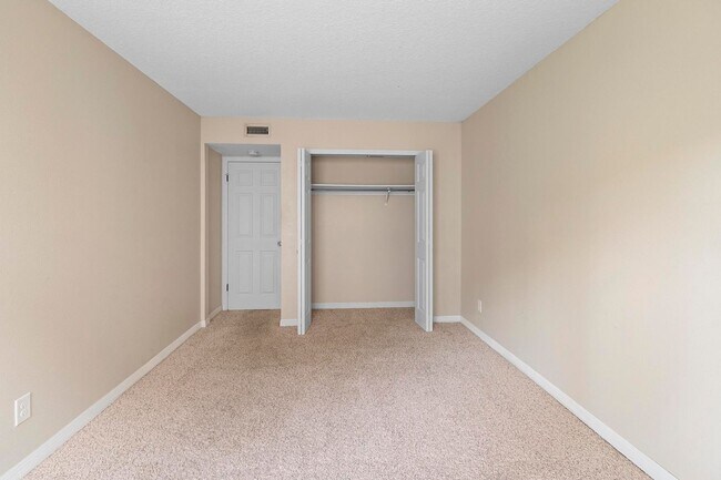 Building Photo - Lakefront lifestyle in this stunning 3-bed...