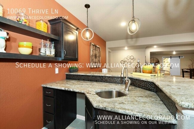 Building Photo - 10069 Thrive Ln