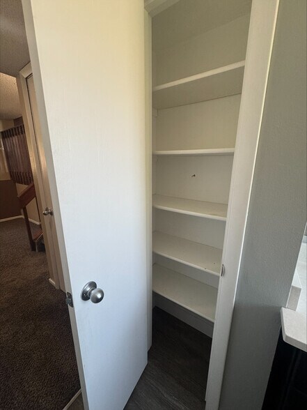 garden level bathroom with linen closet - 5879 S Oak St