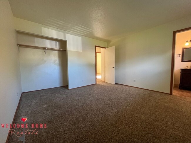 Building Photo - Beautiful Remodeled Rambler!!!  Come enjoy this HUGE backyard!!  NEW CARPET!!