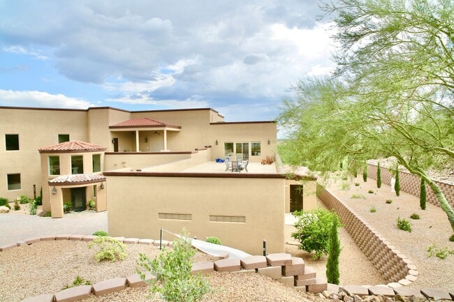 Building Photo - Mountain and City Views from this Furnishe...