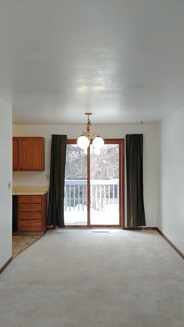 Building Photo - Home in Lolo with Fenced Yard and Pets Considered