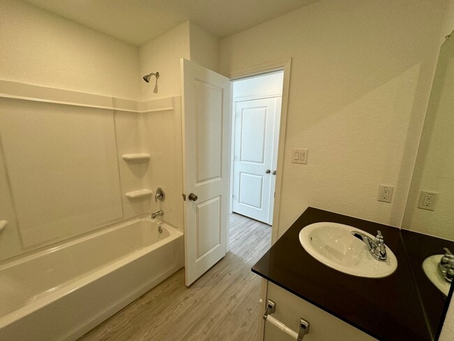 Building Photo - Modern 4-Bedroom Home with Community Pool ...