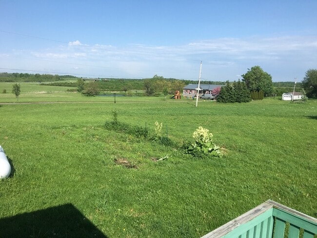 Building Photo - Beautiful secluded 4 bedroom 2.5 bath home with 2 stall detached garage and descent sized yard