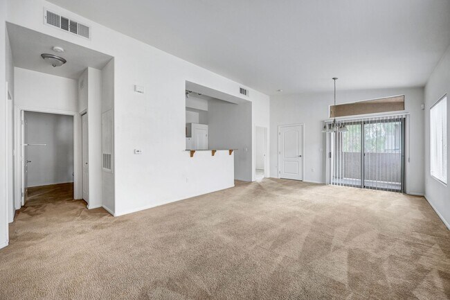 Building Photo - Second Story Condo with Open Floor Plan and Granite Counters