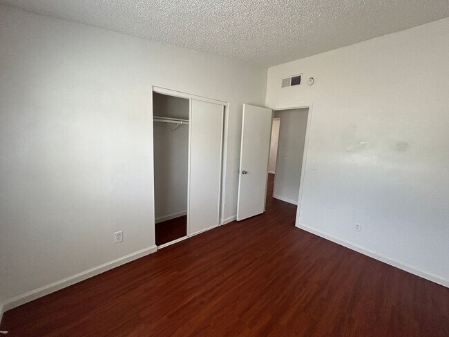 Building Photo - Single story home with large backyard and huge carport with plenty of storage.