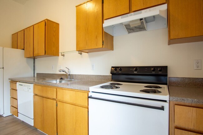 Building Photo - FREE RENT: Contemporary One Bedroom w/New Luxury Vinyl Flooring + Vaulted Ceilings!