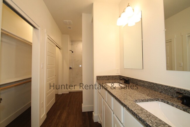 Building Photo - Upscale Four-Bedroom Townhome!