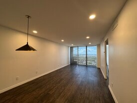Living room with updated dimmable LED lighting. - 1502 S Boulder Ave