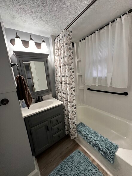New bathtub/shower combination with sturdy grab bar - 1841 E 5th St