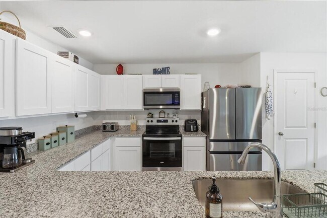 Building Photo - 8361 N Elkcam Blvd