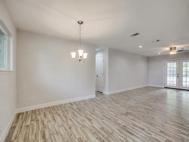 Standing at Entry Door, Open Concept Dining/Living; Hallway to Bedrooms - 301 NW Wintercrest Rd