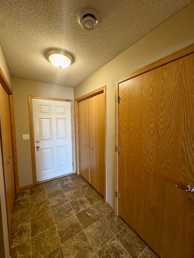 Building Photo - Move in August 8, 2025, and get August ren...