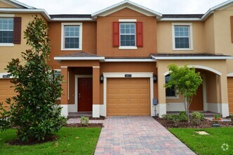 Building Photo - Cute 3/2.5 Townhouse with 1-Car Garage in ...