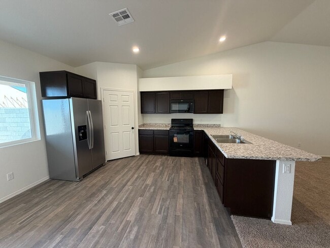 Building Photo - BRAND NEW TOWNHOME!