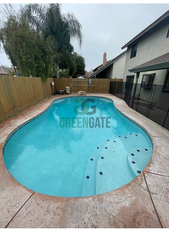 Building Photo - PRICE REDUCED! Beautiful 3 bedroom 2.5 Bath home READY NOW in MODESTO!! With POOL!!