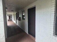 Building Photo - 7406 Woodmont Terrace