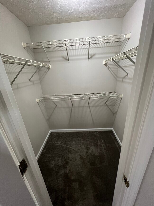 Master bedroom closet. - 32 Lexington Cir